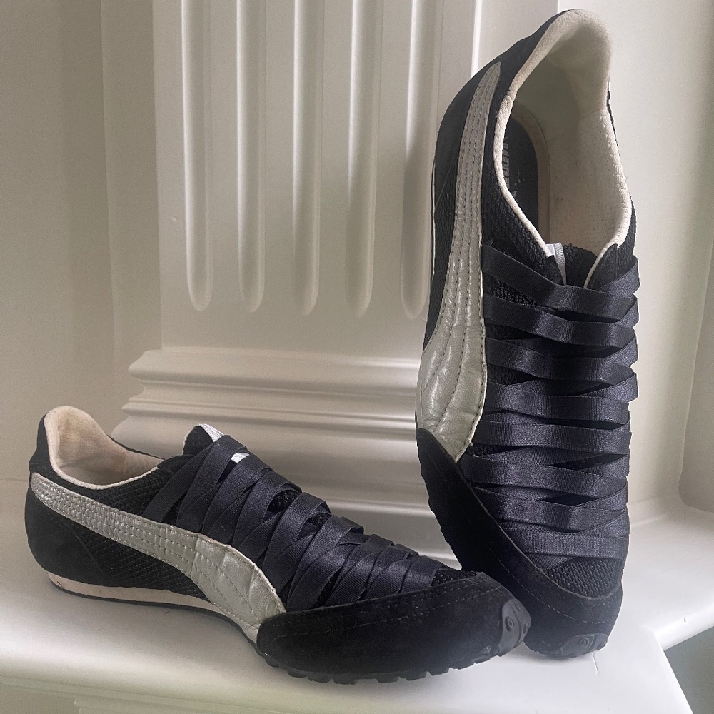 Women’s Puma black slip-on sneakers